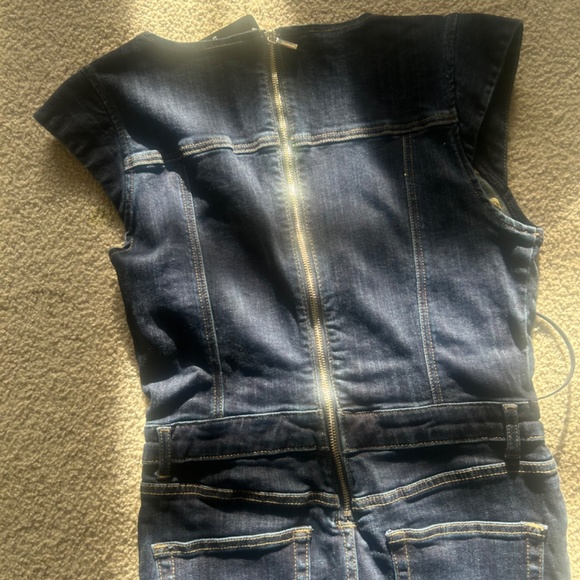 Bebe Embroidery Detail Sleeveless Flared Denim Jumpsuit - Picture 2 of 4